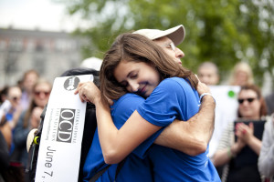 Carrie welcoming her father, Denis Asselin, at the finish of his 2012 walk from Cheyney, PA, to Boston.