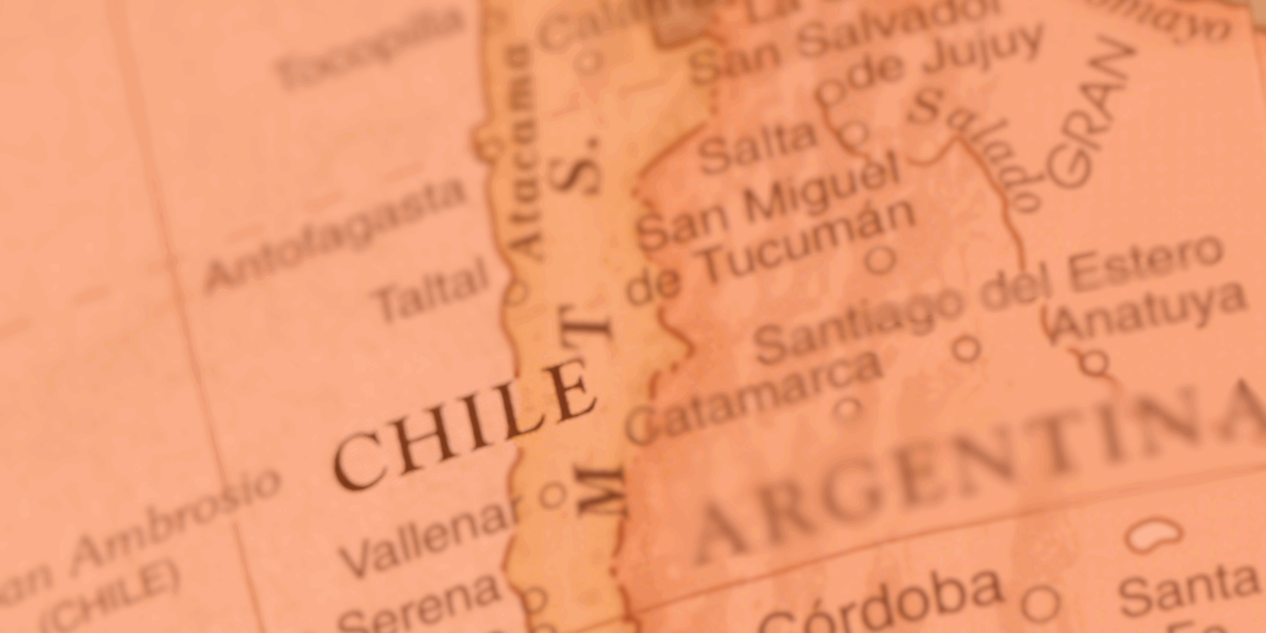 Close-up of a vintage-style map highlighting Chile and parts of Argentina, with the word "CHILE" in bold capital letters near the center.