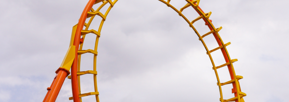An orange roller coaster loop