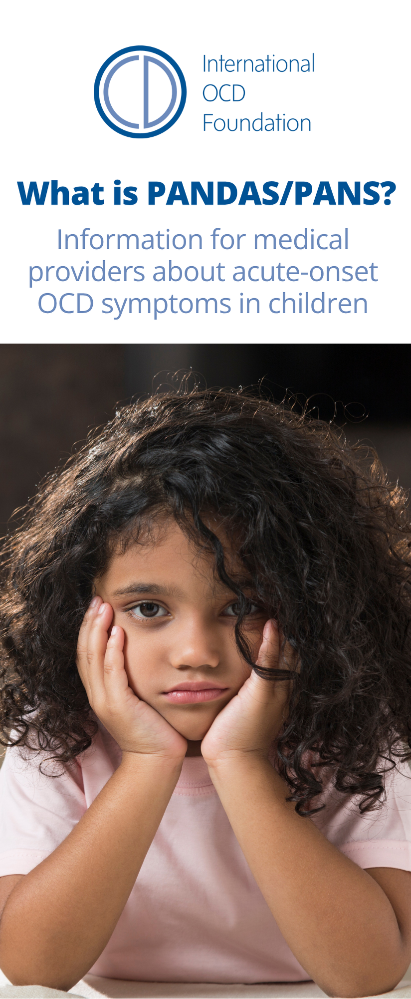 Cover of an International OCD Foundation brochure titled ‘What is PANDAS/PANS? Information for medical providers about acute-onset OCD symptoms in children,’ featuring a young girl with curly hair resting her face in her hands and looking sad.