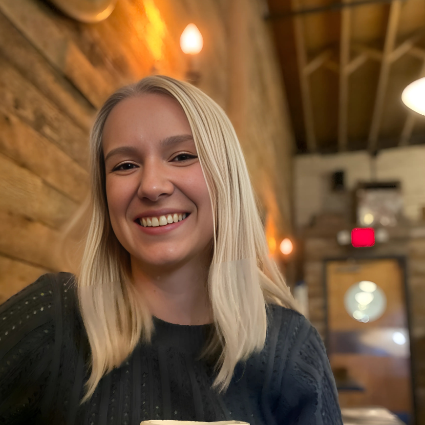 Megan Remer 6.10.25 White woman in black shirt with blonde hair.