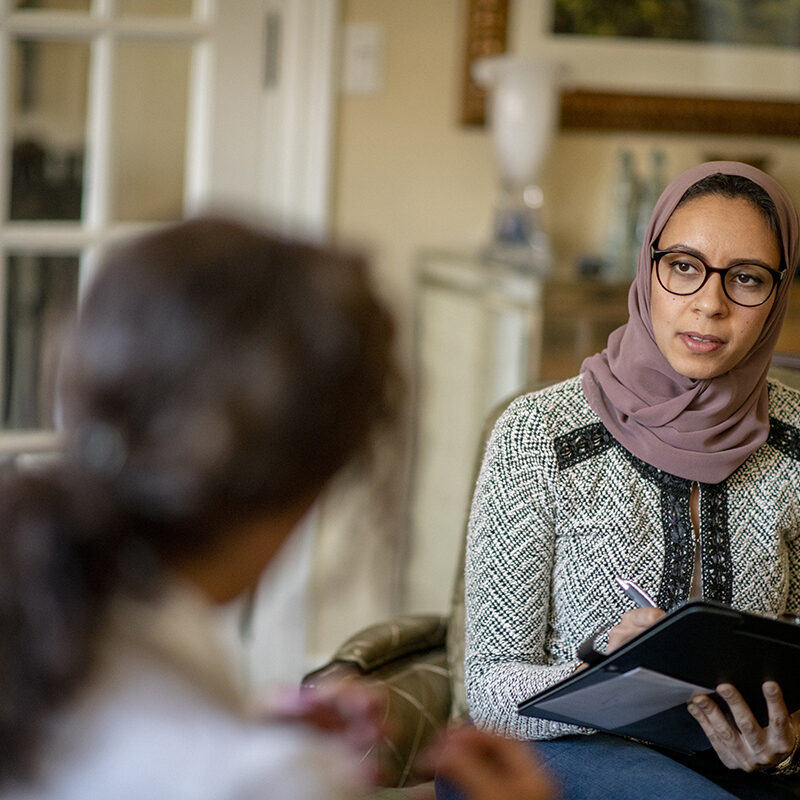 Young Muslim woman at a counselling session.